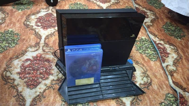 PlayStation 750 GB two controller and cooling fan 4