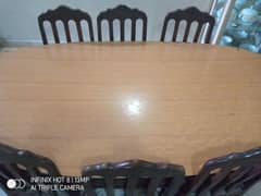 Wooden Dining table with 8 chairs