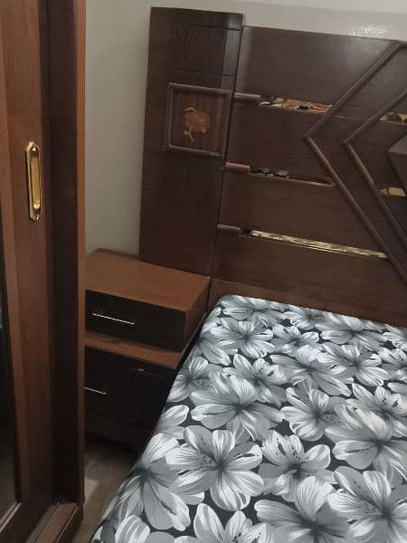 Full size Wooden Bed set with 2 side tables in complete new condition! 4