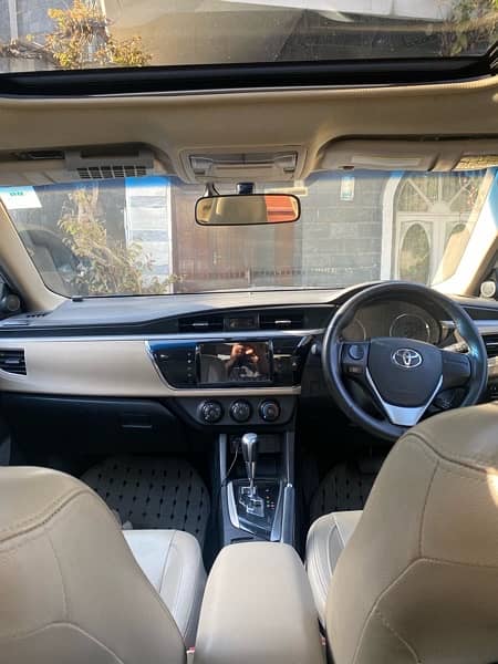 Corolla Grande 1.8 Super white full option 10