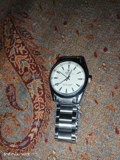 silver Rolex watch branded