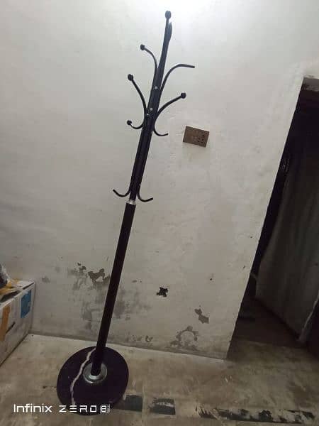 Clothe stand with marble black base urgent sale 1