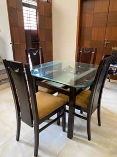 4 chair dining table with glass