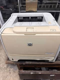 HP color & B/W laser printer in good working condition for sale 0