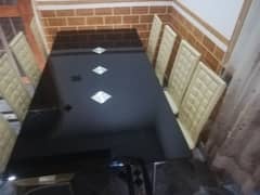 Urgent sale Dining table  with 8 chairs,(pure leather)