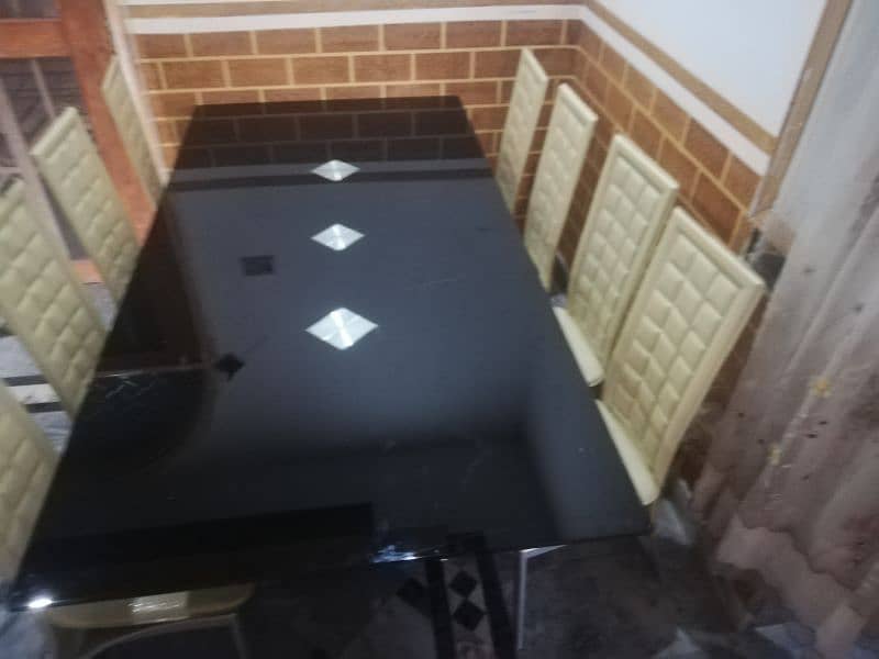 Urgent sale Dining table  with 8 chairs,(pure leather) 1