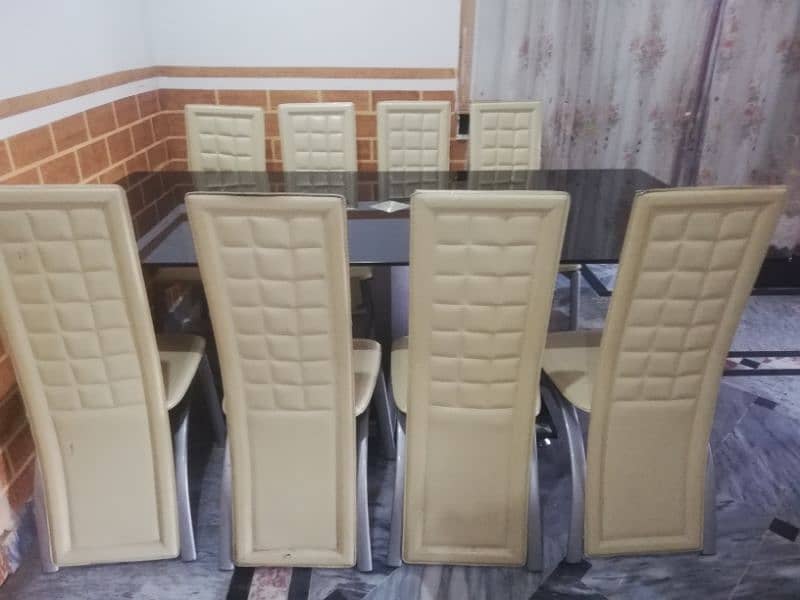 Urgent sale Dining table  with 8 chairs,(pure leather) 5