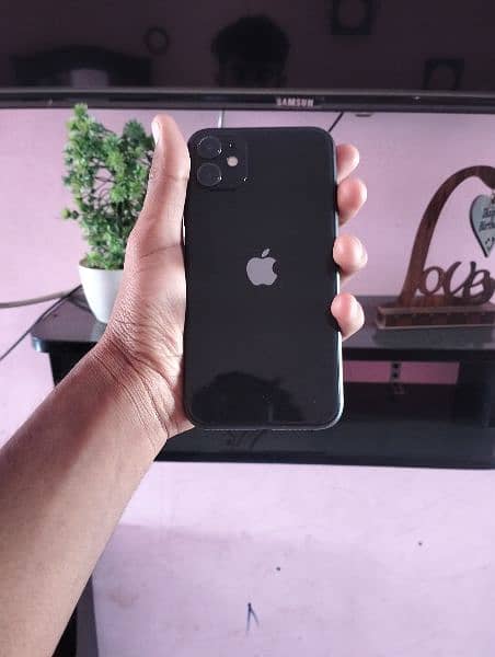 iPhone 11with original charger waterpack 10by 10condition 1