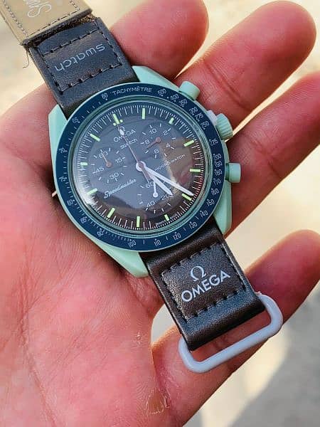 Omega and swatch beautiful coronograph watch 0