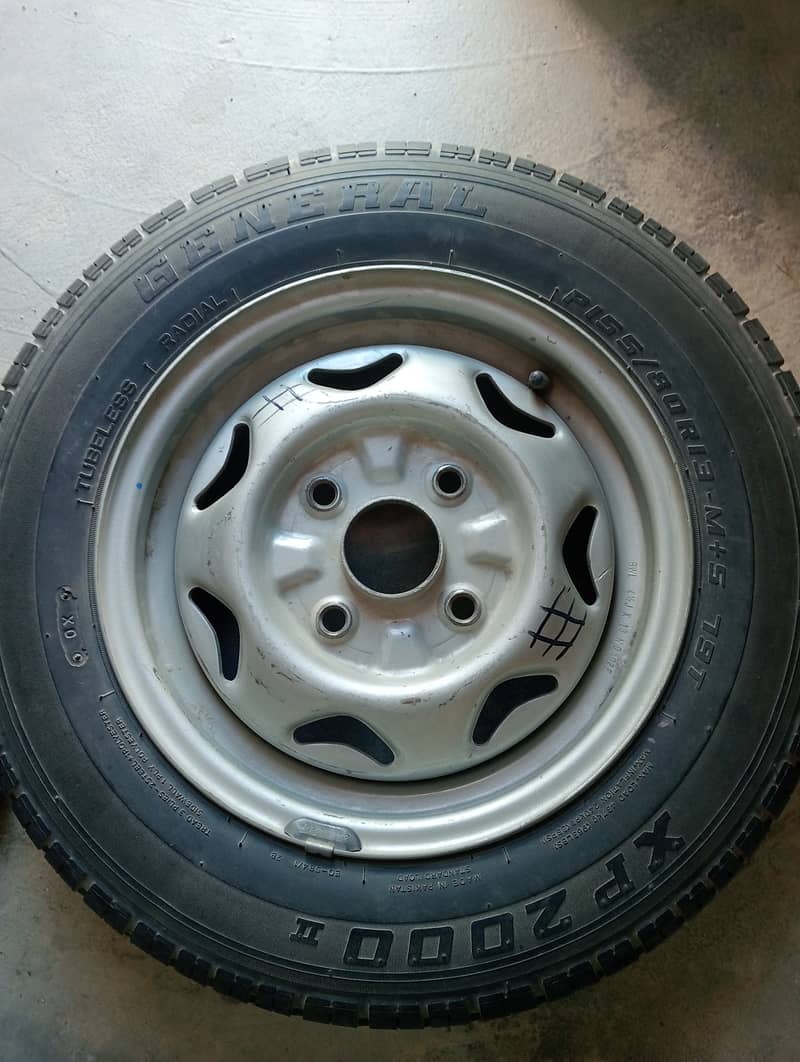 Tyre with rim in good condition 0