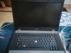 DELL LAPTOP USED WITH a black bag cover and original charget