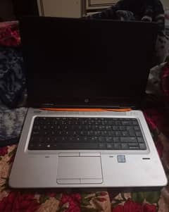 hp laptop ( grey and black colour ) with charger 0