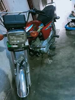 Honda. 125. bike good condition. computer number plate. tyre new
