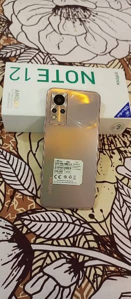 Infinix Note 12 (6 Months Official Warranty + PTA Approved + Gold) 1