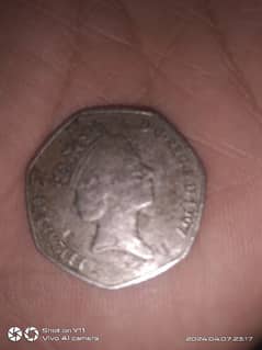 fifty pence English coin