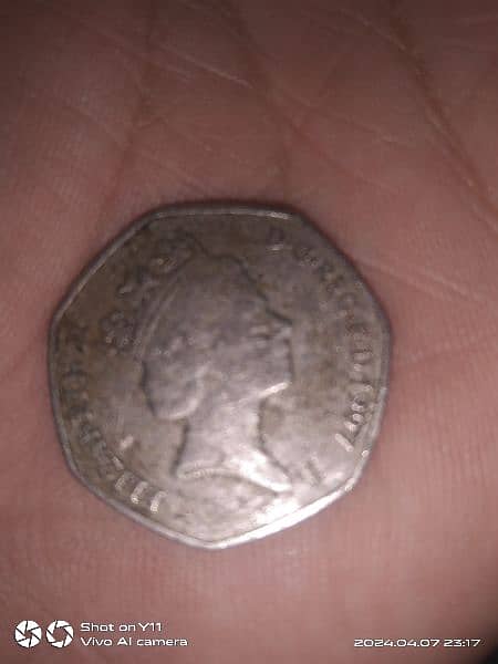 fifty pence English coin 0