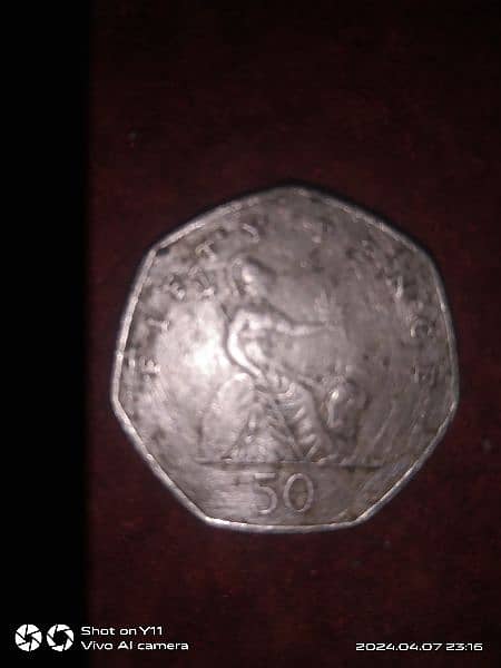 fifty pence English coin 1