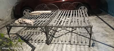 Set of two iron beds