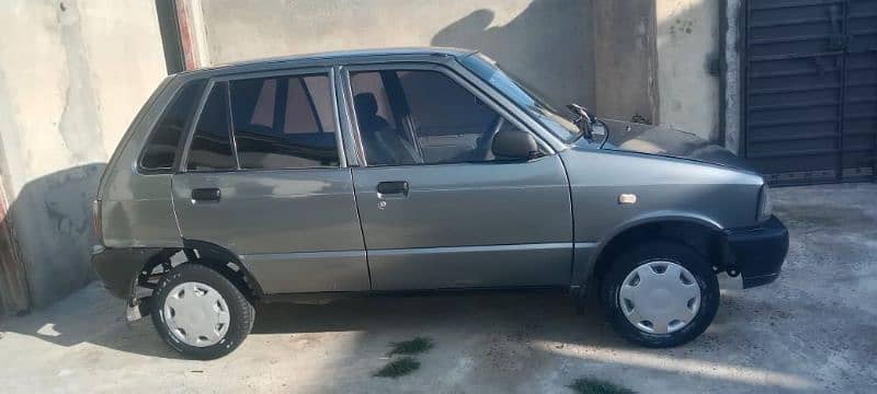 mehran 2010 model minor touching 10% only  03155072106 9