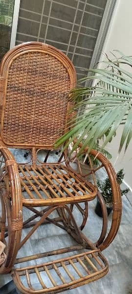 excellent condition cane swing chair rocking chair for sale 0