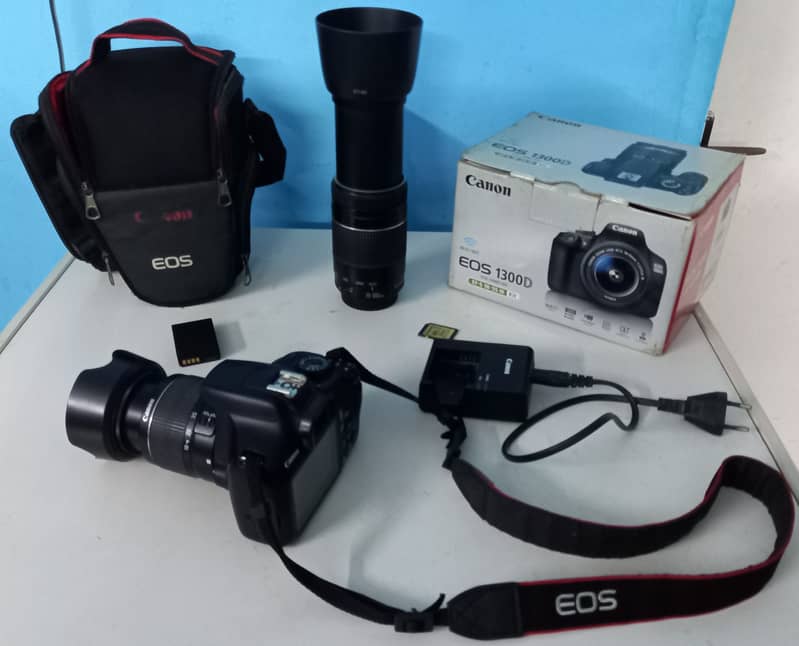 Canon EOS 1300D DSLR CAMERA (wifi/NFC ), lens; 18-55 & 75-300 0