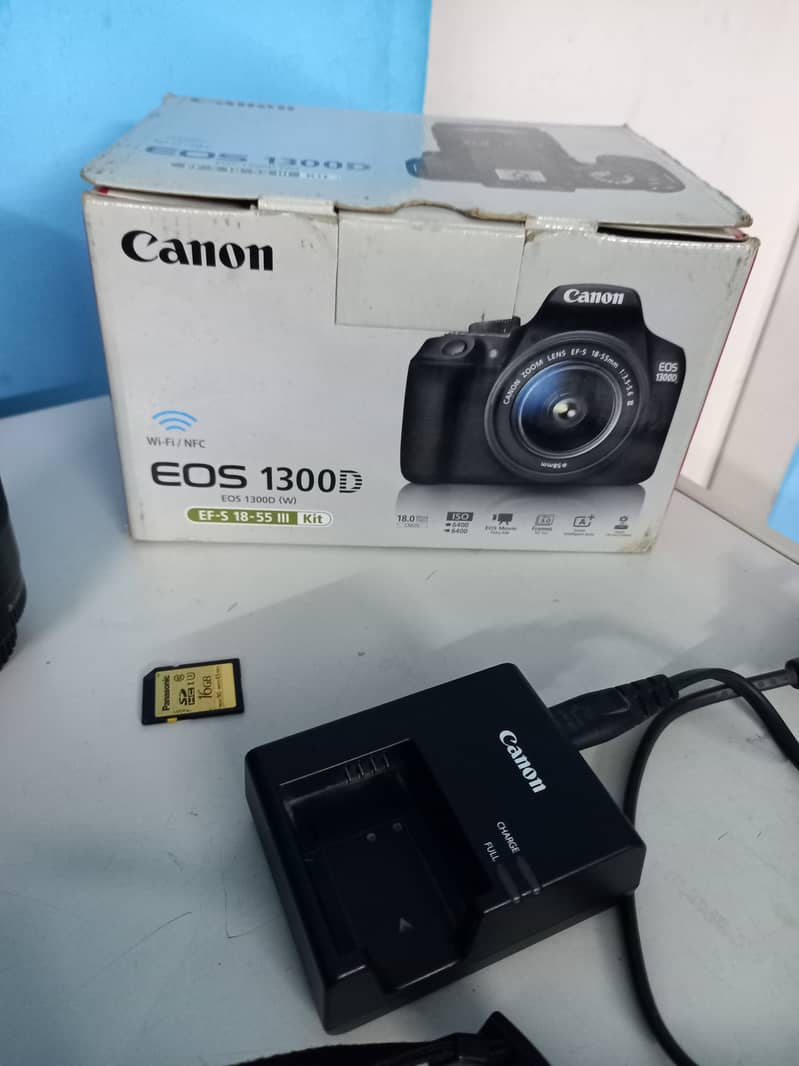 Canon EOS 1300D DSLR CAMERA (wifi/NFC ), lens; 18-55 & 75-300 8