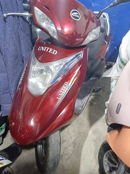 petrol and electric scooty available contact at 03004142432 14