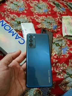 Tecno Camon 18T with box and 3 cases.