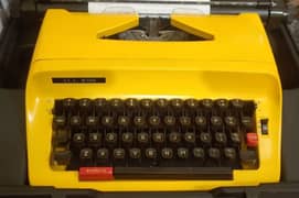 TYPEWRITER Fully with cover case fully functional