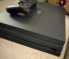 PlayStation 4 Pro 1 TB with One Remote 0