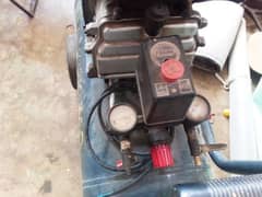 good condition air compressor 2 wall low and high 0