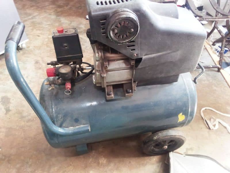 good condition air compressor 2 wall low and high 1