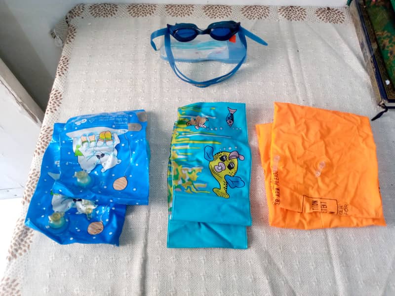 Swimming equipment, googles and costume 1