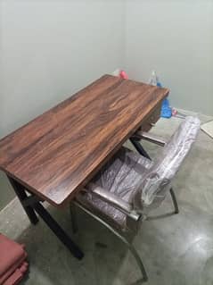 New wooden study table and used centre table