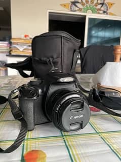 Canon d1200 with professional Len's and 32gb card