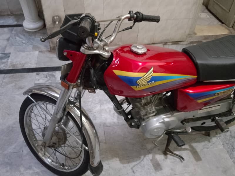 Honda 125 Lahore number zero meter bik 1