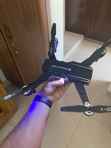 Baichun Drone boxpack dual cam with 2 batteries 7