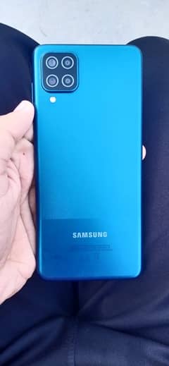 Samsung a12 . . . . . 4 128. . . . . . . with box and charger. . . . condition 10 by 9