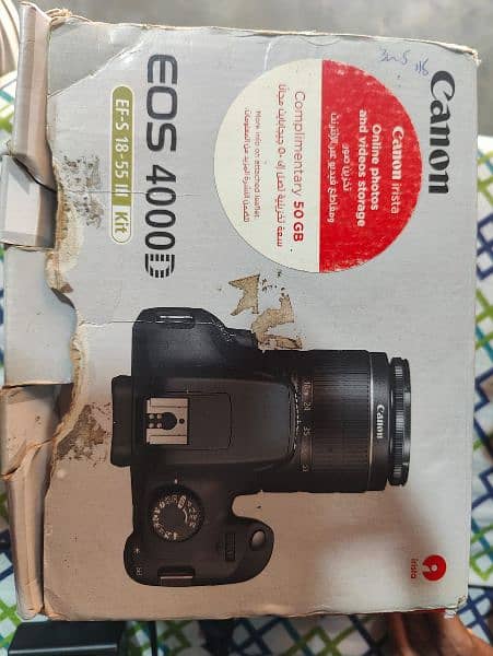 Canon eos 4000d full kit with 18-55mm lens battery and charger 2
