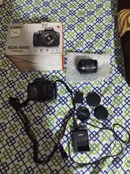 Canon eos 4000d full kit with 18-55mm lens battery and charger 11