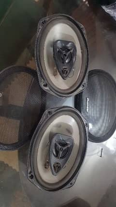 Car speaker pair. . . Car amplifier and Pioneer CD changer⁶
