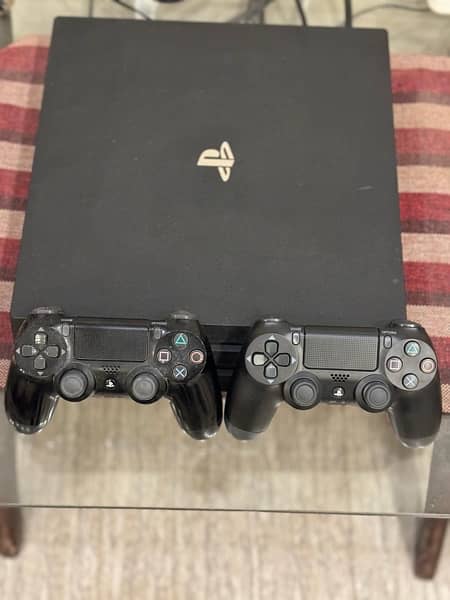 Ps4 Pro 1TB,Dual charging Dock and PS4 Games and two controllers 0