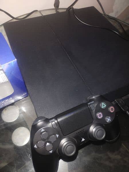 PlayStation 4 fat 500gb 1200 series with one controller and three cds 1