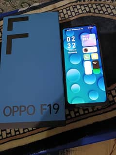 Oppo mobile f19 with box charger and hand free