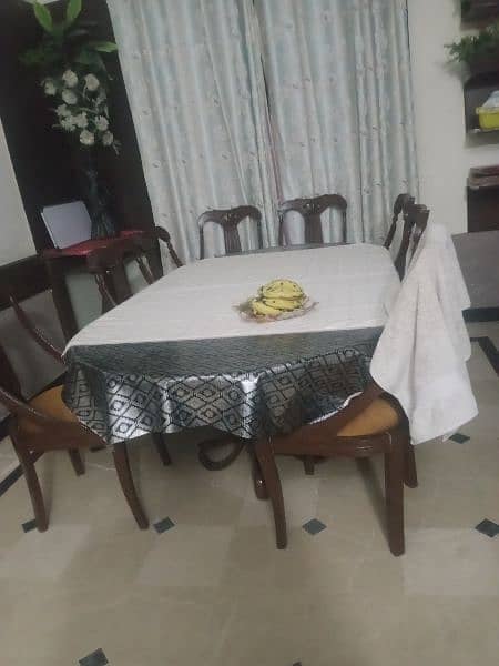 dining table with 8 chairs. 1