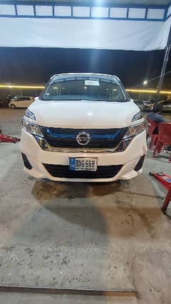 Nissan sarena E power 7 seater dual Ac and much more