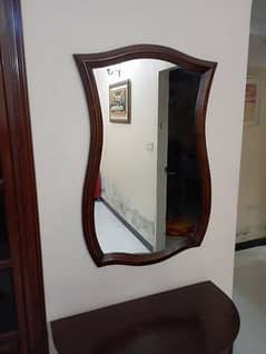 Elegant wooden console with mirror