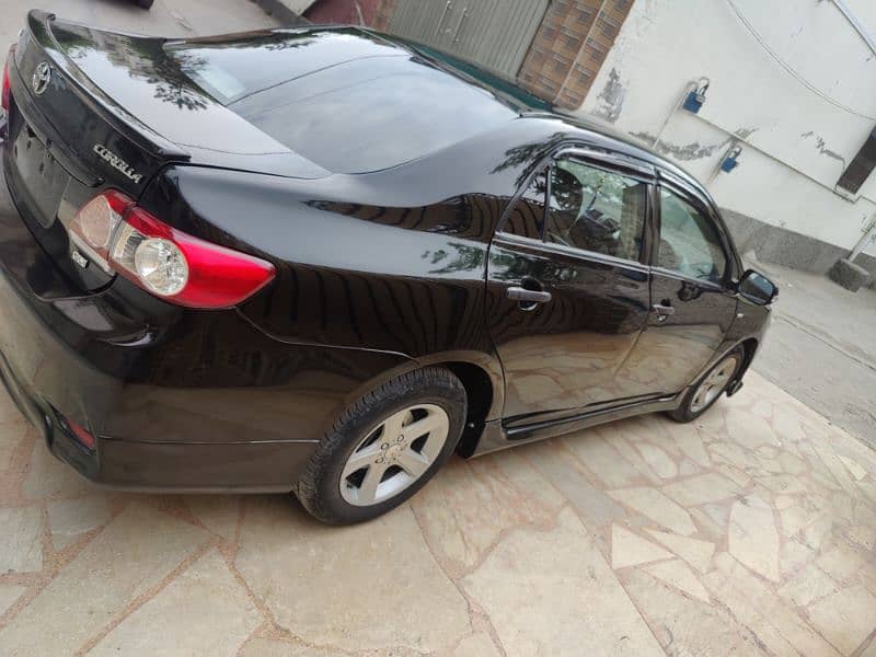 Corolla 2014 Model 100 percent fit condition phone number 03018811536 2