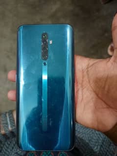 Oppo Reno 2f Box + Charger full smaan thora se penal pr line he