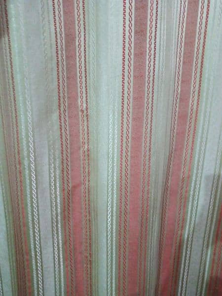 6 curtains maroon + light silver colour. very less used 4